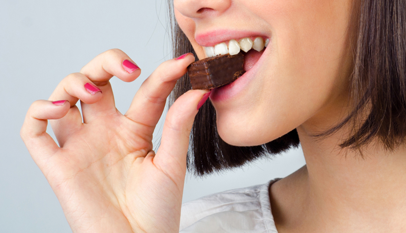 Woman eating Sugar