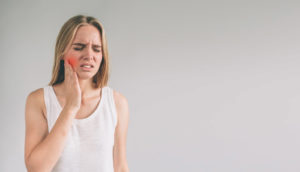 Woman with tooth pain